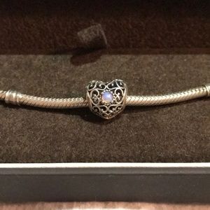 Pandora bracelet with October charm